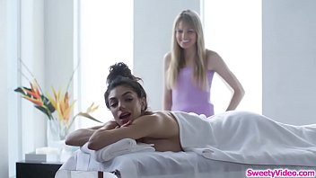 Busty babe licked by lesbian masseuse