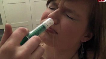 Girl injects cum up her nose with syringe [no sound]